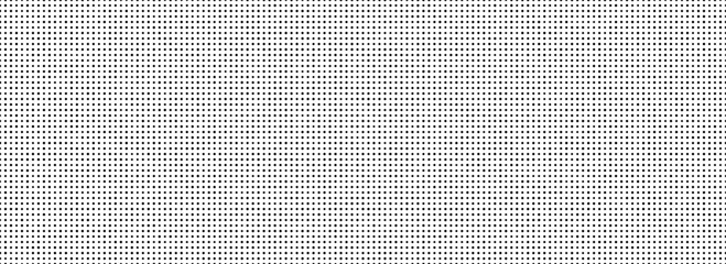 Seamless uneven dotted repeated texture. Black and white random polka dot pattern. Repeated endless backdrop. All over halftone wallpaper. Regular grid background. Vector textile or fabric swatch