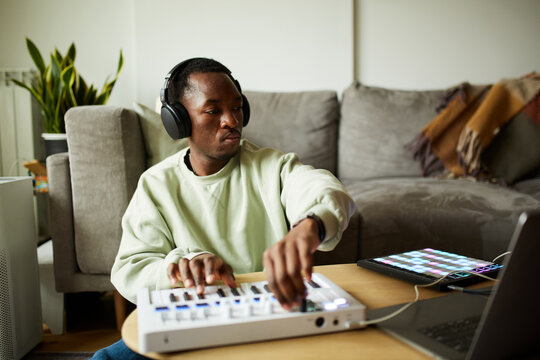 Man creating music from home