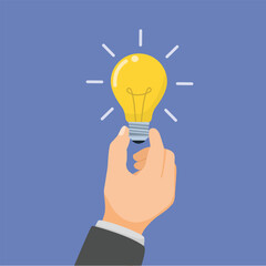 Businessman hand holding a glowing light yellow bulb showing business ideas, creativity, solution, innovation, and inspiration
