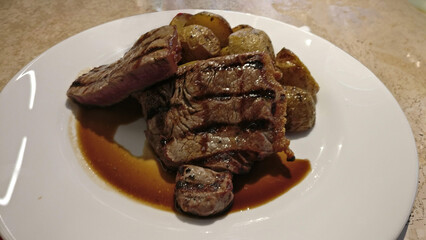 A plate of sirloin steak and potatoes, steak, meat, dinner, beef