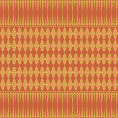 Traditional Thai-inspired seamless pattern,intricate geometric motifs in warm orange and gold tones.Thai sarongs textiles,diamond shapes,symmetrical detailing,ideal for fabric prints,cultural designs