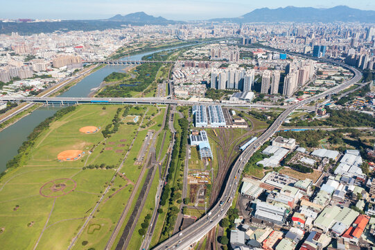 Aerial View of Urban Landscape with Highways and Railways