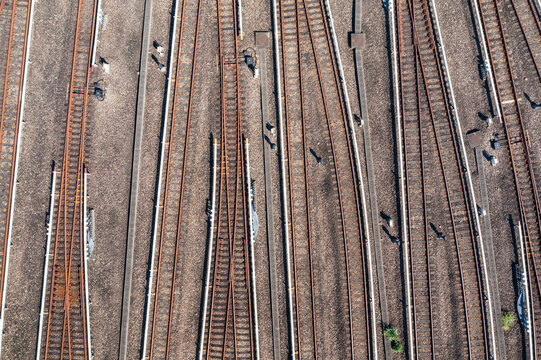 Aerial View of Multiple Railway Tracks with Greenery