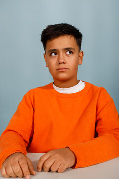 Young boy with a puzzled expression 