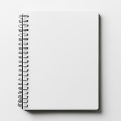 Blank spiral notebook on white background, ready for notes or design