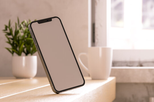 Minimalist Smartphone Mockup in Bright Home Setting