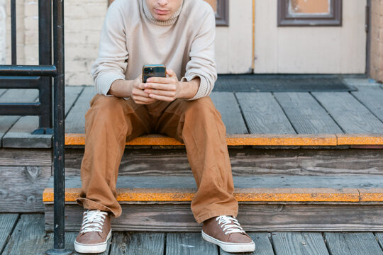 Cropped Mobile Steps Man