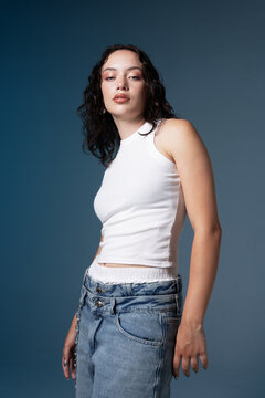 Fashion model in a studio environment with lighting equipment