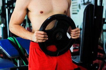 Exercising in a gym and using quality sports equipment is important for muscles.