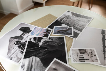 Artistic photo prints on table