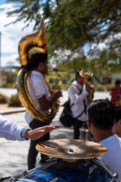 Musicians resting under a tree in Oaxaca, Mexico