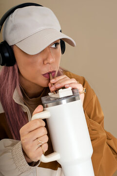 Woman Drinking from Mug