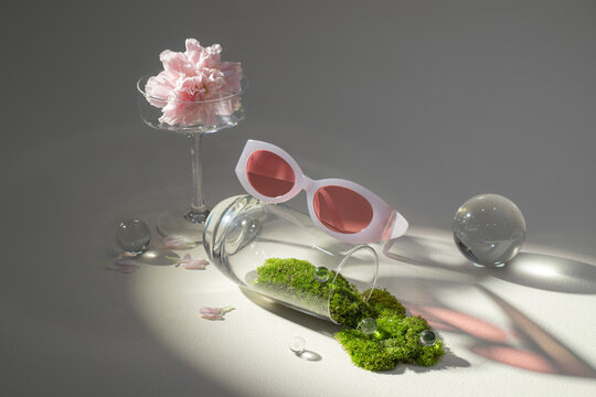 A still life composition showcasing stylish sunglasses
