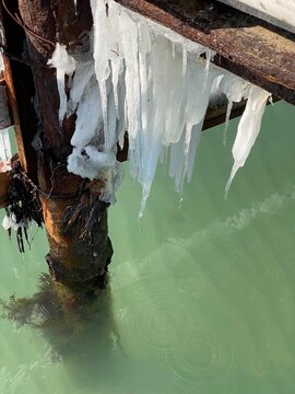 icicles on a bridge by the sea