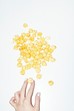 Cheddar cheese flavoured popcorn snacks with hard direct flashlight