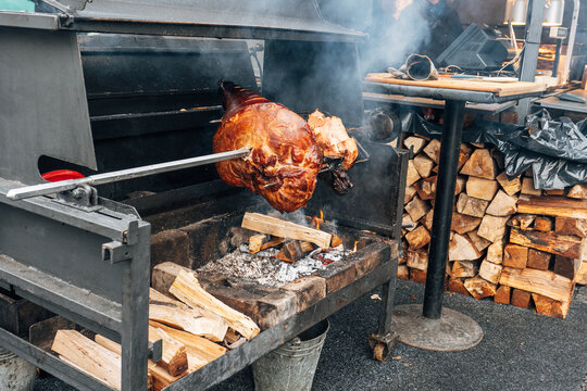 Traditional Pork Knuckle Roasting Over Open Fire In Prague