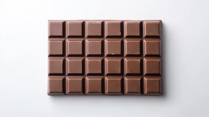 Fototapeta premium Smooth and Creamy Milk Chocolate Bar on a Clean White Background Perfect for Treats, Desserts, Sweet Snacks, and Chocolate Lovers' Delight
