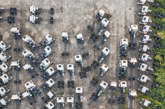 Aerial View of Numerous Truck Chassis in Parking Lot