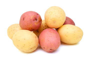 Stack red and yellow potatoes on white background