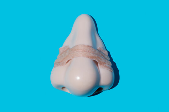 nose wearing a nasal strip