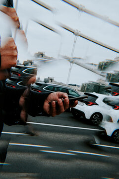 man using his smartphone on the street in Budapest