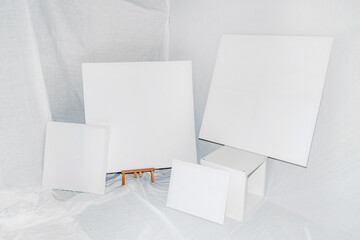 Blank white canvases in art studio