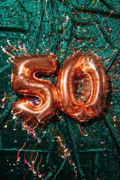 number 50 and confetti, with a shutter dragging effect