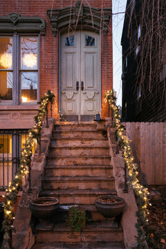 Brownstone Entrance Decorated with Festive Lights