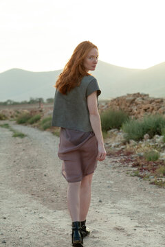 redhead in barren landscape