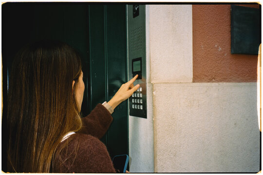Tourist checking in at a vacation apartment in the city of Lisbon