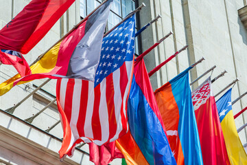 World flags outside the Permanent Court of Arbitration Vienna Office.