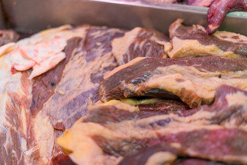 Variety of meat displayed for sale