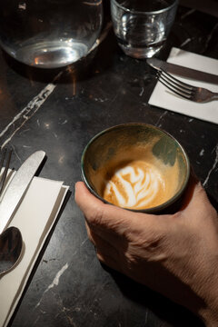 Coffee Reflection on Marble Table