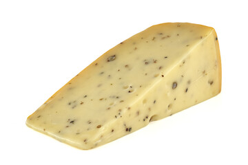 Triangular piece of cheese with herbs and pepper resting on white background