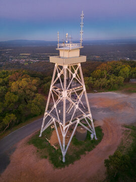 Lookout tower on a hilltop at twilight