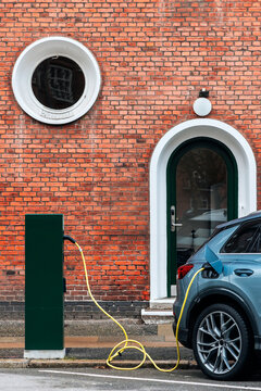 Electric Car In A Charging Station