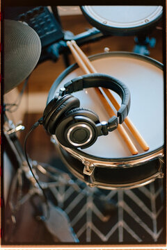 Headphones on electric drum kit