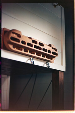 Hangboard mounted on a wall