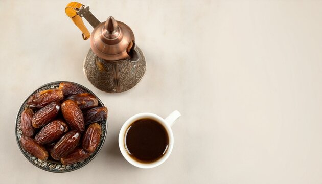 Dates, coffee, and a traditional pot. A simple yet elegant still life.