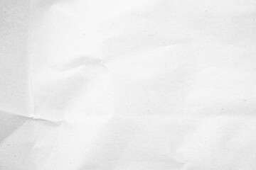 White recycled craft paper texture as background. Grey paper texture, Old vintage page or grunge vignette of old newspaper. Pattern rough art creased grunge letter. Hardboard with copy space for text.