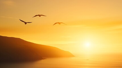 Obraz premium Golden Sunset Over Coastal Landscape