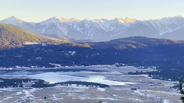 A static frame capturing Lake Matemale and the Pyrenees Mountains in France
