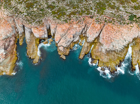 Rocky coastline with crevases and chutes