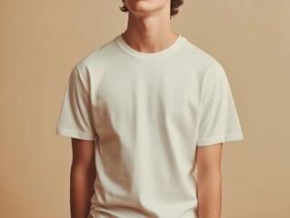 Person in Neutral T Shirt Casual Clothing Simple Design and Pose on Beige Backdrop Minimalistic Style