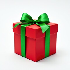 Fototapeta premium Vibrant Red Gift Box on Fresh White Background with Green Ribbon and Bow