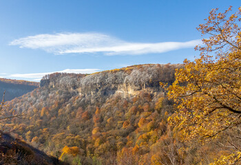 morning in a mountainous area, frost fell on the trees, the first rays of the sun awaken nature