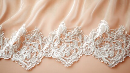 Obraz premium Peach fabric with lace trim