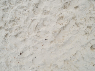 beach sand texture background with footprints