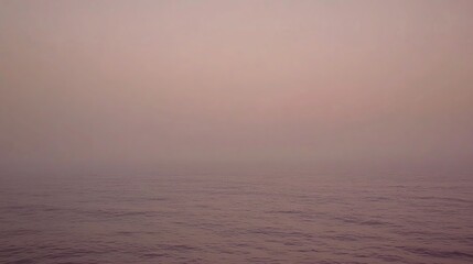 Obraz premium Ocean fog, hazy sunset, sea mist, calm waters, travel brochure