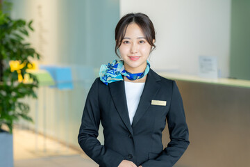 受付の若い女性【撮影協力:スカパー東京メディアセンター】	